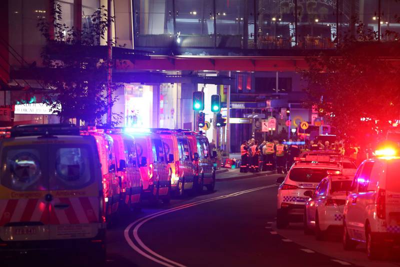 BONDI JUNCTION, AUSTRALIA - APRIL 13: NSW police and ambulance vehicles line the street outside Westfield Bondi Junction on April 13, 2024 in Bondi Junction, Australia. Six victims, plus the offender, are confirmed dead following an incident at Westfield Shopping Centre in Bondi Junction, Sydney. (Photo by Lisa Maree Williams/Getty Images)