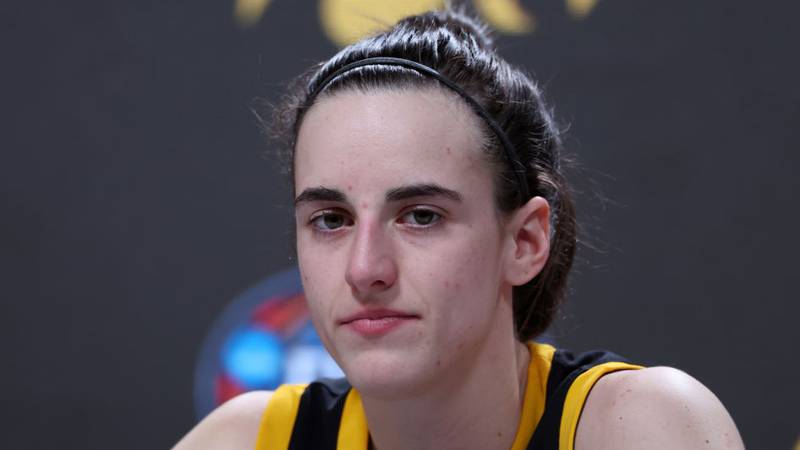 CLEVELAND, OHIO - APRIL 07: Caitlin Clark #22 of the Iowa Hawkeyes speaks with the media after losing to the South Carolina Gamecocks in the 2024 NCAA Women's Basketball Tournament National Championship at Rocket Mortgage FieldHouse on April 07, 2024 in Cleveland, Ohio. South Carolina beat Iowa 87-75. (Photo by Al Bello/Getty Images)